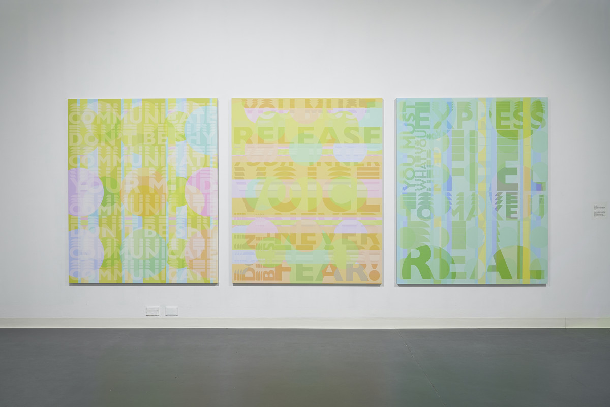 Three large canvas works. The works are collaged with patterns and words in pastel colours of green, blue, pink and orange.