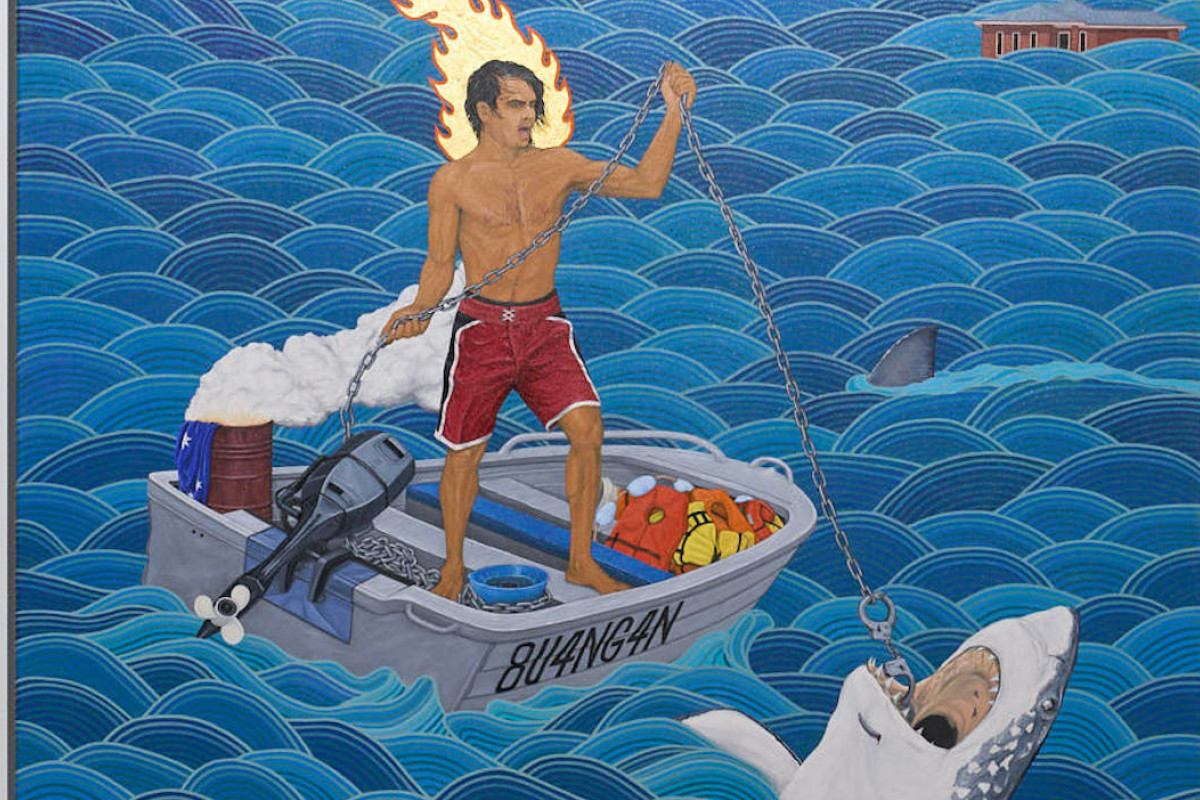 View of one artwork hanging on a wall within the gallery space, through the perspective of two archways.