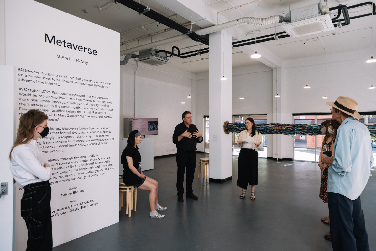 Auslan interpreter and ACE Artistic Director Patrice Sharkey communicating with audience.