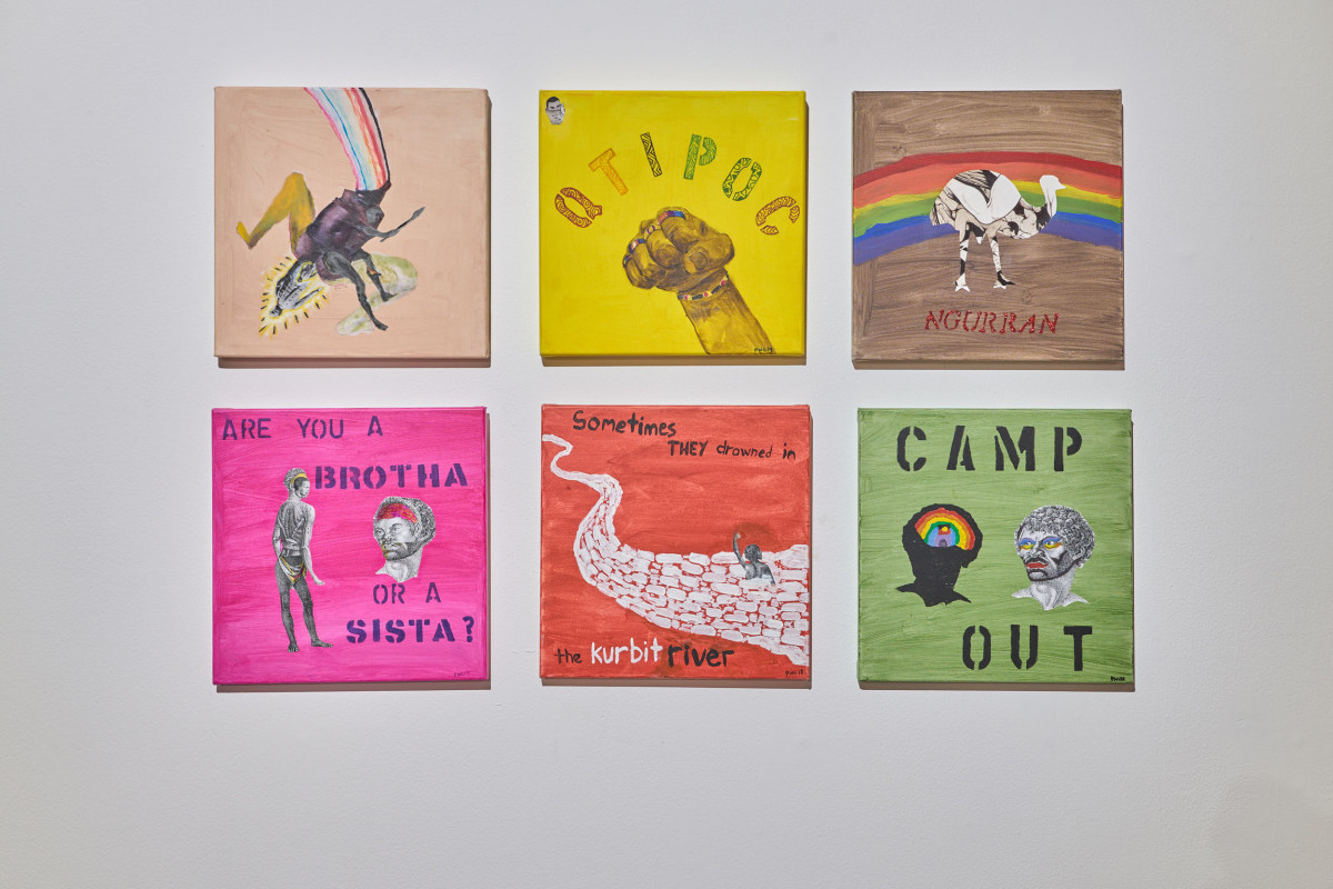 Six small colourful artworks hang on a white wall.