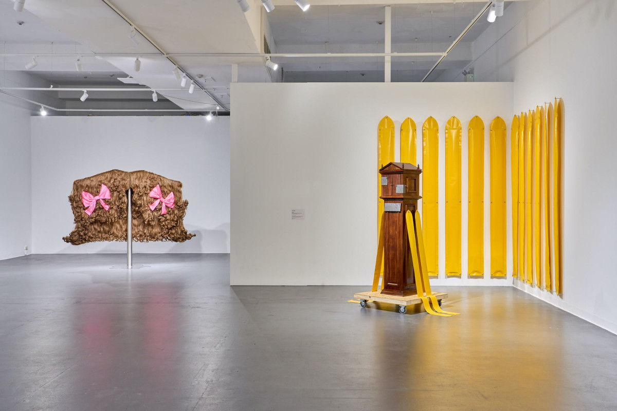 A wide view of various works in the gallery.