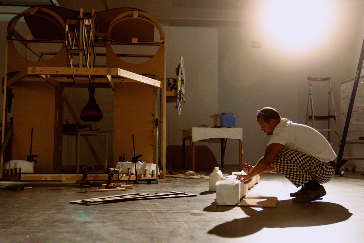 Kaspar Schmidt Mumm working on the teeth of Rockamora. In the background sits Rockamora's skeletal head.