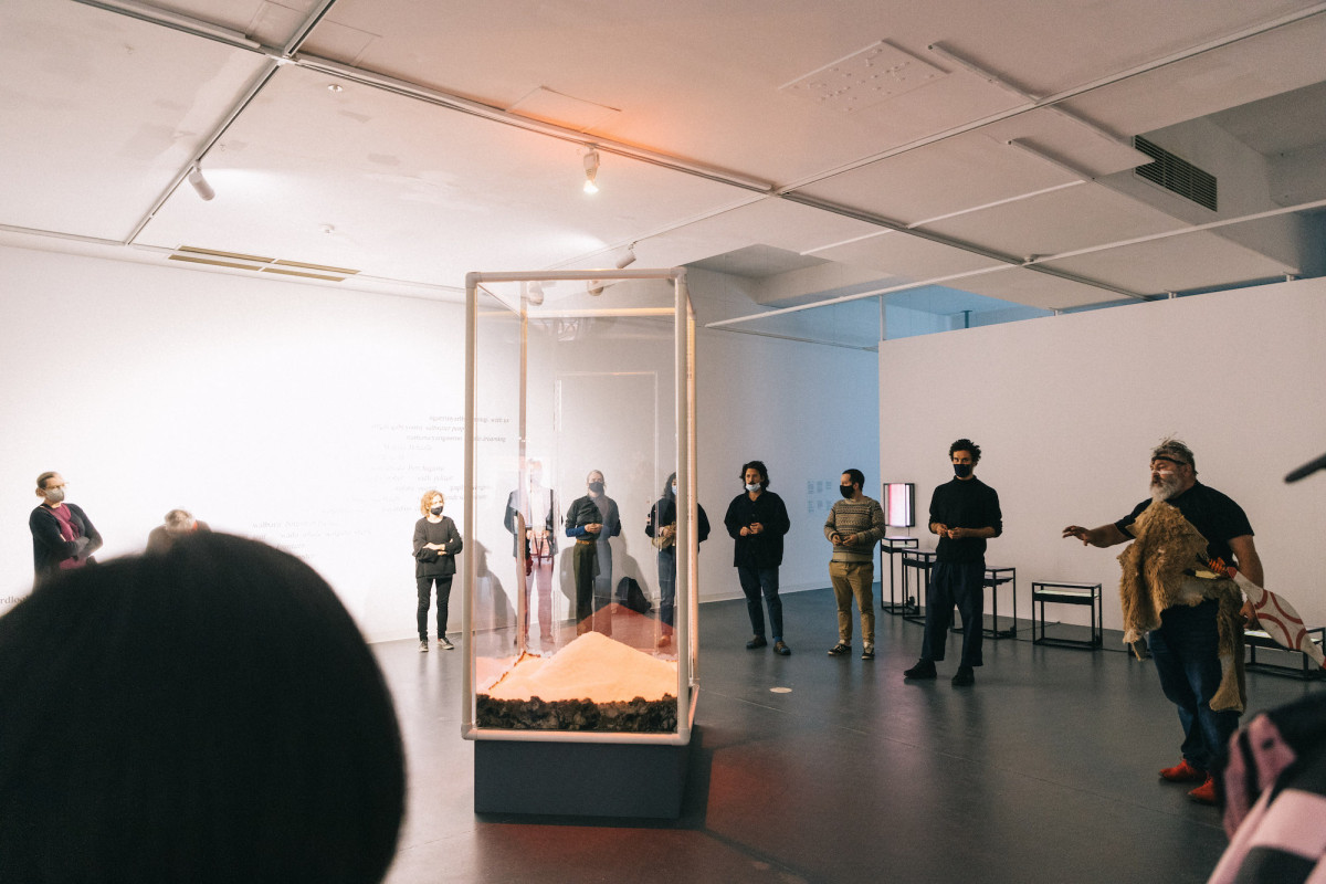 Audience listens to speaker in the gallery.